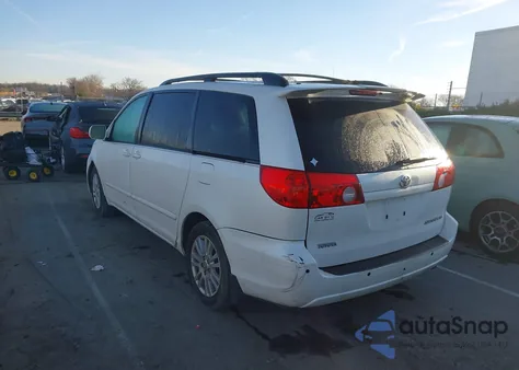 2009 Toyota Sienna Xle z USA, uszkodzony, nr VIN 5TDZK22C09S255844